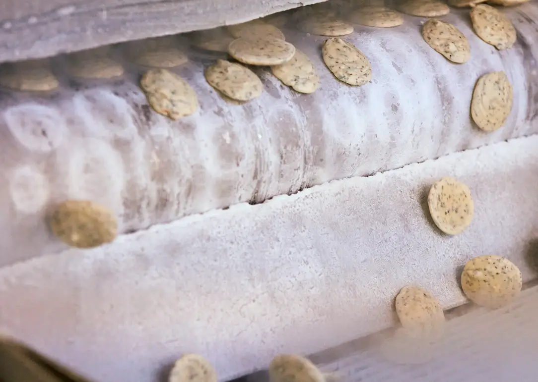 Flavored butter dollops on parchment