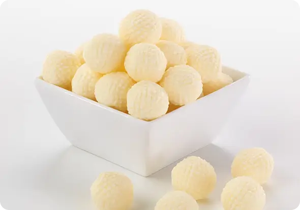 A plain wrapped butter pat labeled Boring beside an elegant Butterball rosette labeled Beautiful