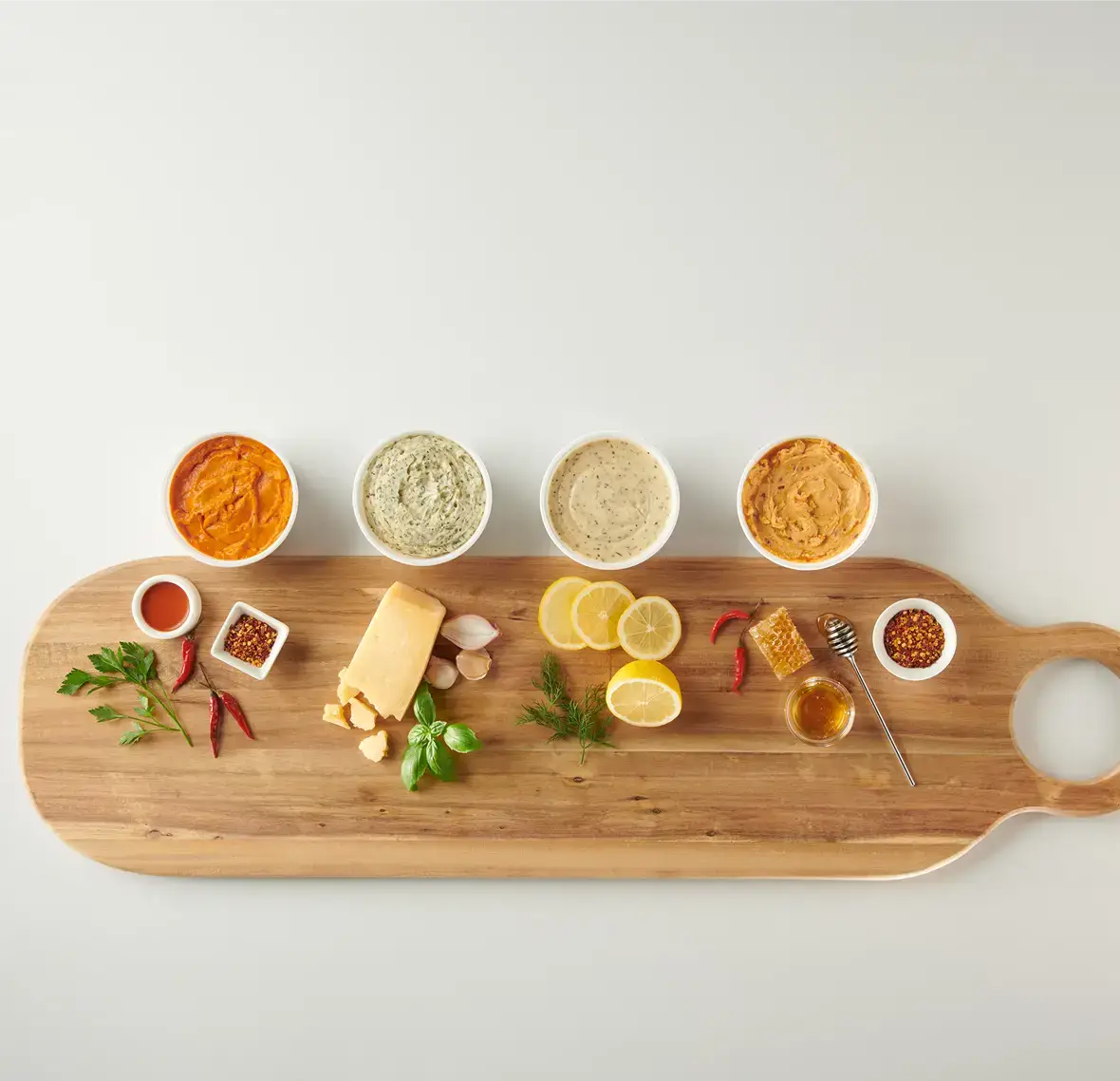 An assortment of Butterball Farms flavored butter dollops in different colors and flavors