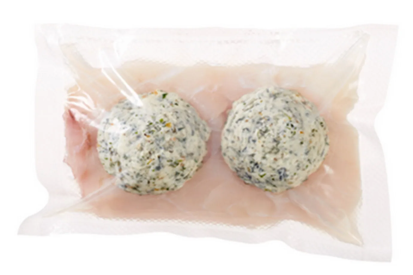 Two herb butter dollops on vacuum-packed fish fillets
