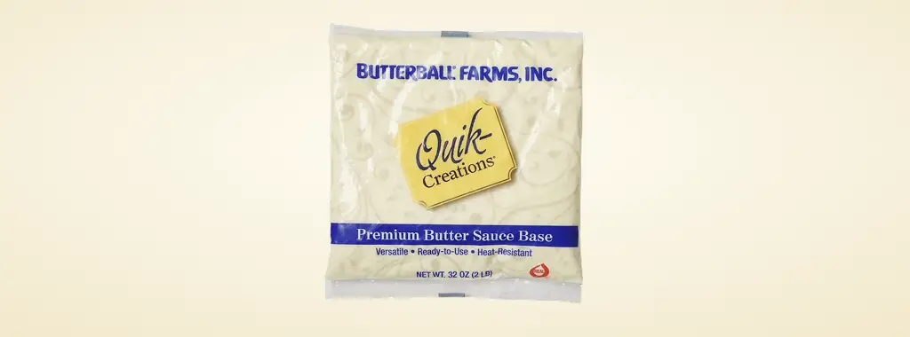 Quik-Creations Premium Butter Sauce Base bag on a cream background
