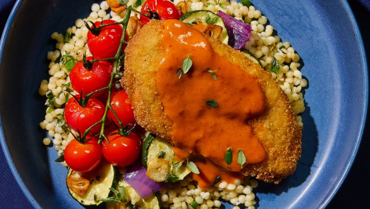 Main dish topped with butter-based sauce