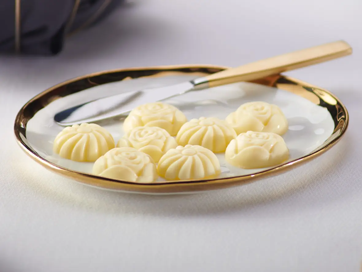 Butterball Farms trademarked butter roses on a white plate